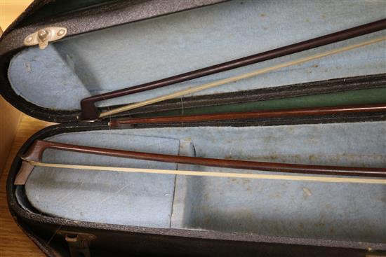 A violin and two bows